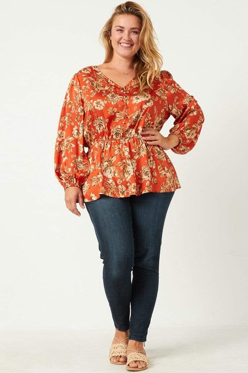 http://shopravelonline.com/cdn/shop/products/plus-satin-like-buttoned-floral-peplum-blouse-33384833056980.jpg?v=1635733975